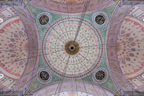 A picture of the colorful and gorgeous interior of the New Mosque, in Istanbul