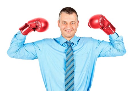 An image of a business man boxing