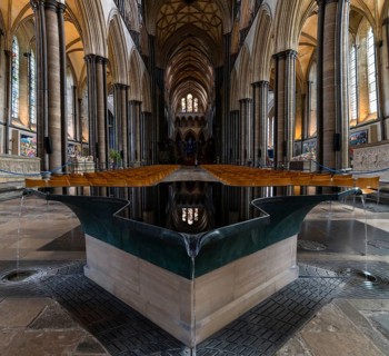 Salisbury, United Kingdom, 8 September, 2022: view of the font by William Pye and the central nave