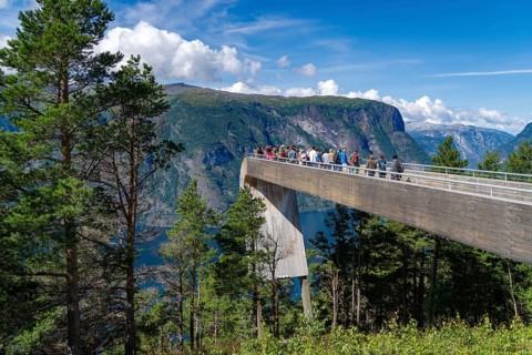 NORWAY, AURLANDSVANGEN, AUGUST 1, 2023: High viewpoint over the Aurlandsfjord, crowded with