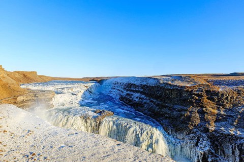 Gullfoss waterfall with ice, Hvítá river, Haukadalur, Golden Circle, South Iceland, Iceland, Europe