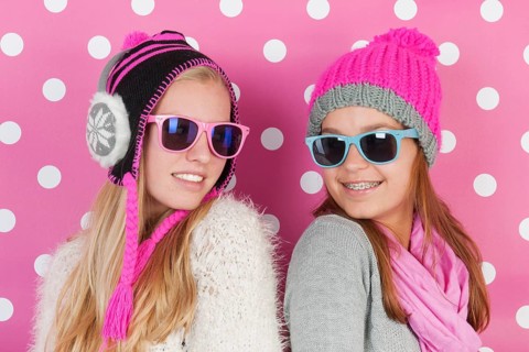 Two fourteen years old teens as girlfriends in winter