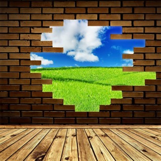 Summer scenery through the hole in the brick wall of room with wooden floor