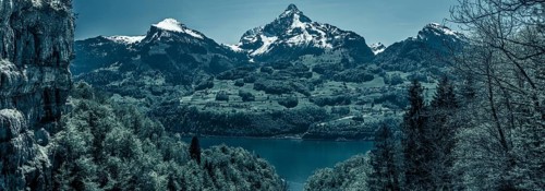 Great panorama over the lake Walensee and its beautiful surroundings, the snowy mountain peaks and