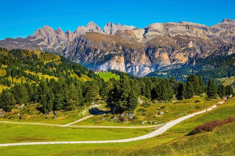 Windy sunny autumn day. Travel to South Tyrol, Dolomites. The concept of extreme and ecological