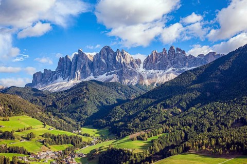 Charming old little church in the Val de Funes. Dolomites on a sunny autumn day. The beautiful