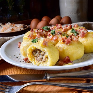 Polish dumplings with meat and mushroom sauerkraut filling