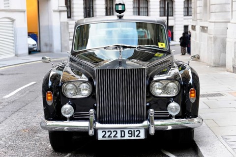London, London Region, England, United Kingdom, Europe, Black luxury car with shiny finish in a