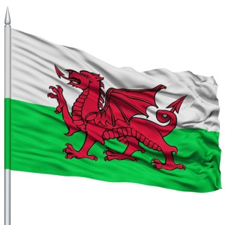 Wales Flag on Flagpole, Flying in the Wind, Isolated on White Background