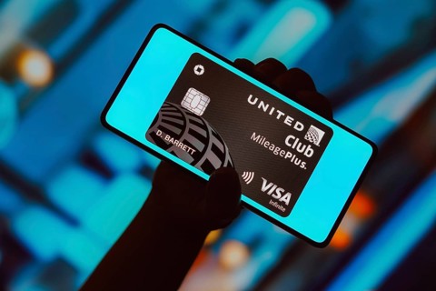 In this photo illustration, the United Club Infinite Card is displayed on a smartphone screen