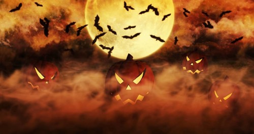 Halloween Pumpkins At The Cemetery Rising From The Mist With Clouds and The Moon In The Background