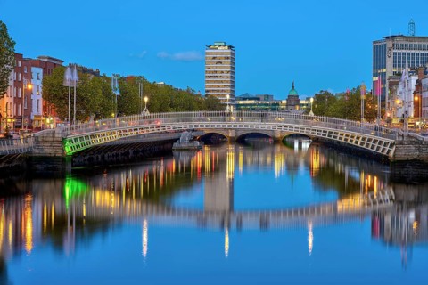 The River Liffey and the famous Ha'penny Bridge in Dublin, Ireland, at dusk, Europe
