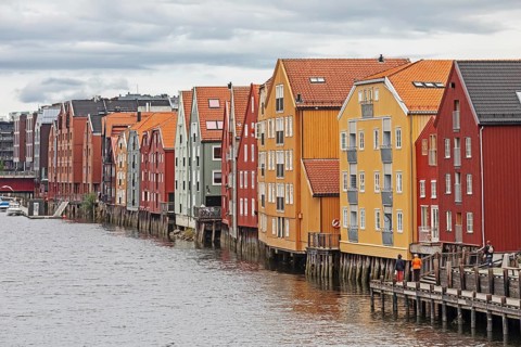 Colourful old timbered storehouses at the river Nidelva in Trondheim, Norway Colorful old timbered