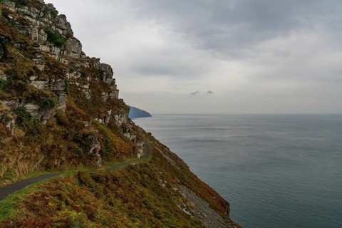 View of the narrow hiking trail on the coastal walk in the Valley of the Rocks in Exmoor in North