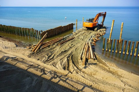 Construction equipment on the shore, the construction of breakwaters, coastal protection measures,