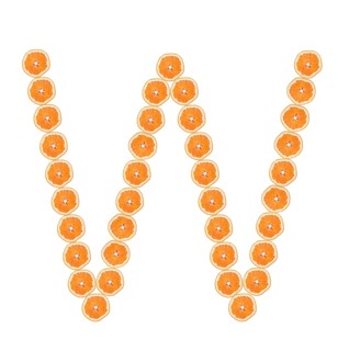 Letter W from orange slices isolated on white background