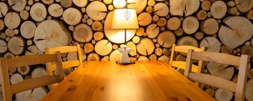 Christmas banner, living room interior table in wooden house, room decoration, lamp and angel