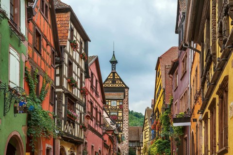 Main street with historical houses in Riquewihr, Alsace, France, Europe