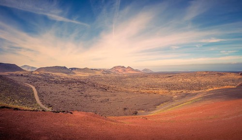 View on the desolate volcanic and moonlike landscape of Timanfaya National Park on Lanzarote, one