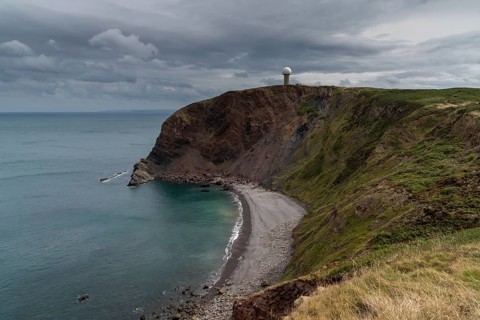View of the cliffs at Hartland Point in Devon with the United Kindom RAF radar station perched on