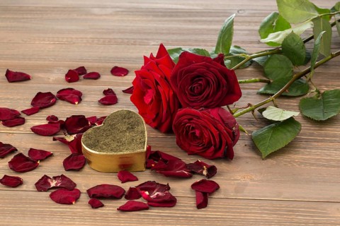 Roses as a gift and surprise for a celebration. Symbol photo for birthday, Mother's Day, love,