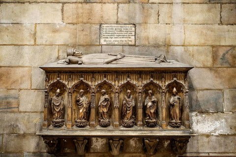 Stone headstone in the Duomo. Milan, Italy.
