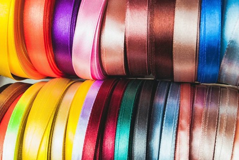 The many-coloured ribbon spools in the craft