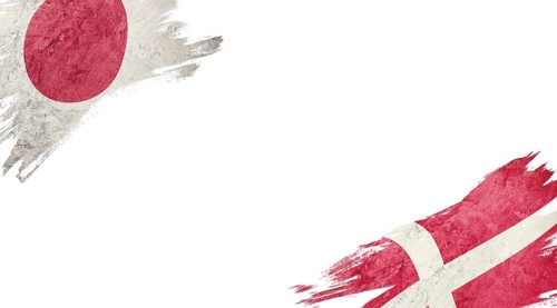 Flags of Japan and Denmark on White Background