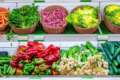 Fruits and vegetables on a supermarket shelf