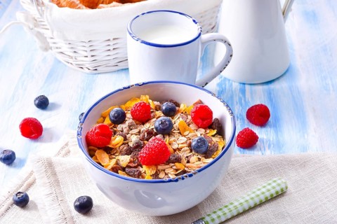 Muesli breakfast menu with forest fruits