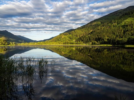 Clouds are reflected in the lake, Gaishorner See in the evening light, Gaishorn am See, Paltental,