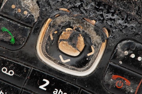Burned GSM. Display and buttons close up