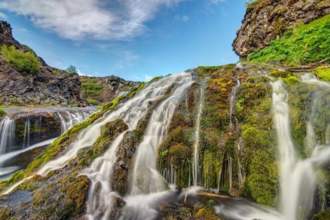 A small water from in the valley of Gjain, Iceland, Europe