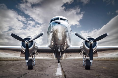 historical aircraft on a runway ready for take off