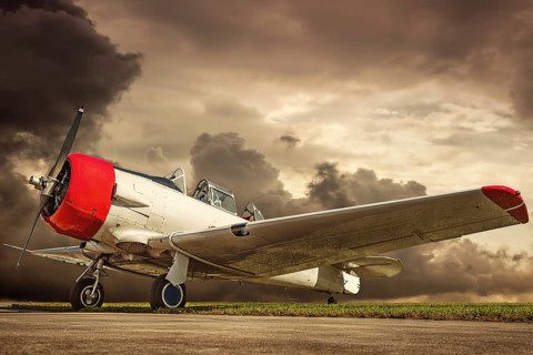 historical airplane on a runway