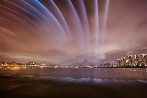 The famous Banpo Bridge is illuminated at night with water fountain display in Seoul, South Korea,