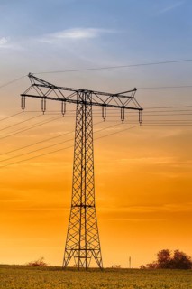 High-voltage power line High-voltage pylon in the sunset