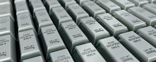 Lots of stacked silver bars