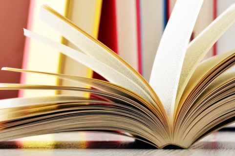 Composition with glasses and books on the table
