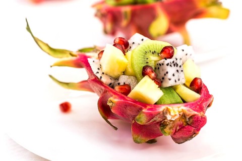 Half pitahaya filled with fruit salad