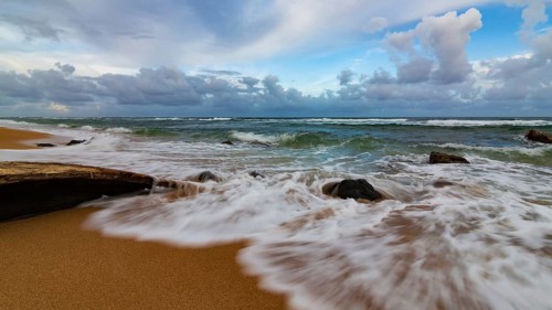 A dramatic sunset looking over the Pacific Ocean. Kauai, Hawaii
