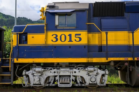 Close-up of a blue and yellow locomotive of the Alaska Railway with the number 3015, Alaska