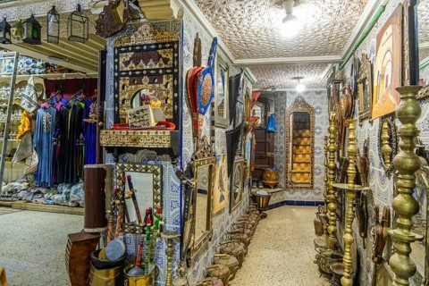 Marketplace in historic medina, full of souvenirs, leather bags, metal pieces, Tetouan, Morocco,