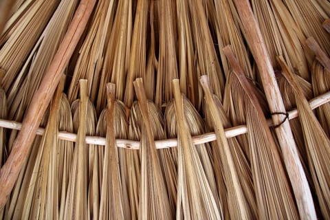 Palm tree leaves in sunroof palapa hut traditional roofing in Mexico