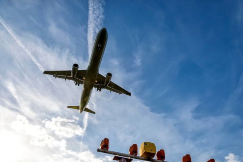 Aircraft on final approach to the airport shortly in front of landing
