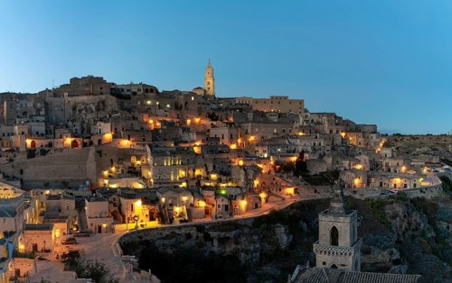 Matera, Italy, 26 November, 2023: view of the old town of Matera after sunset with the lights
