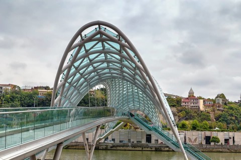 Bridge of Peace is a bow-shaped pedestrian bridge over the Kura River in downtown Tbilisi, Georgia,