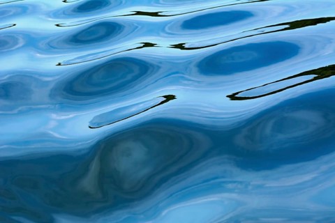 Rippling on the river surface water abstract background. Augustow, Poland, Europe