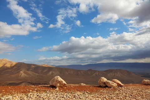 Gorgeous clear day in the Judean desert. Huge boulders along the roads, clear skies