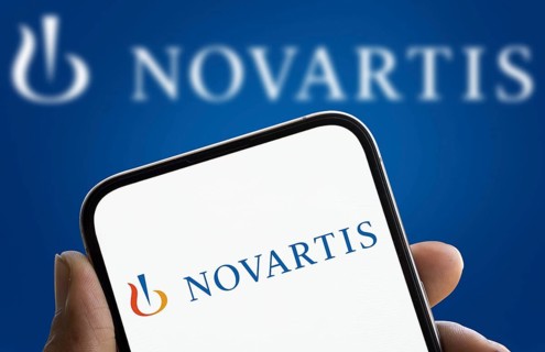 Novartis logo is displayed on smartphone. Novartis AG is a Swiss multinational pharmaceutical